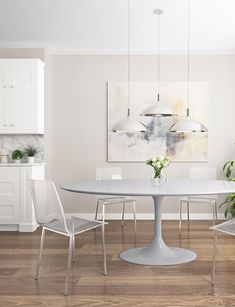 a white table and chairs in a room