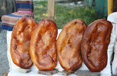 four pieces of bread sitting on top of a table