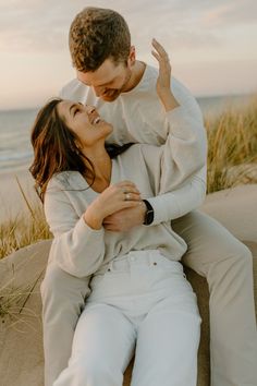 Lake Michigan Beach engagement photos, Michigan wedding photographer, sunset engagement photos on the beach, Lake Michigan photoshoot, West Michigan photographer, candid engagement photos, engagement photo poses, engagement photo inspiration, neutral casual engagement photo outfits Elopement Photoshoot Casual, Casual Fall Couple Outfits, White Jeans Engagement Photos, Neutral Outfits For Couple Pictures, Clean Engagement Photos, Beach Casual Engagement Photos, Neutral Engagement Photos Outfit Ideas, Casual Outfits Engagement Photos, Fall Engagement Pictures Beach