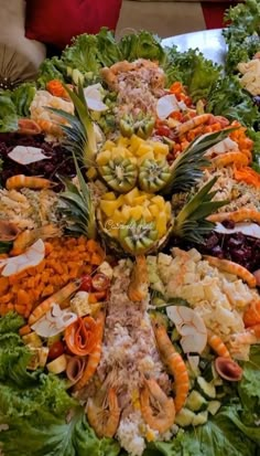 a large platter filled with lots of different types of food on top of a table