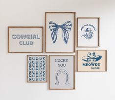 four framed pictures hang on the wall above them are cowboy themed artwork, including cowgirl club and lucky you