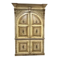 an ornate wooden cabinet with two doors