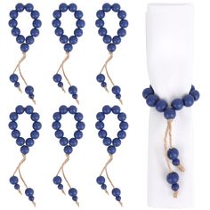 four pieces of blue beads are tied together