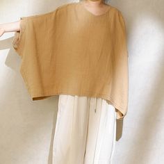 "Pure Linen Puffy Sleeve Blouse For Summer, Linen Blouse For Women, Oversized Fit Shirt Linen Top Casual Loose Linen Tops Plus Size Clothing SIZE LIST FREE SIZE: Lenght:63-65CM/24.8-25.5\" Bust:180CM/70.8\" Shipping Policies: All orders will take the fastest express delivery no extra shipping. Usually 10-15 days to arrive US. To Europe usually 10-20 days. Other countries usually 10-15 days. Safe and quick. This is washing instructions: Suitable for hand wash or machine washing softly Do not bleach Iron on low heat PCE dry cleaning available Tumble dry with low heat Return Policy Kindly cntact us for returning address. You can return the item to my address. When we receive the item may refund for the price of items. Thank you for your love:-)" Spring Oversized Blouse In Solid Color, Oversized Solid Color Blouse For Summer, Summer Oversized Solid Color Blouse, Oversized Blouse For Summer, Oversized Short Sleeve Blouse, Solid Color Relaxed Fit Blouse For Daywear, Relaxed Fit Solid Color Blouse For Daywear, Beige V-neck Blouse With Relaxed Fit, Oversized Solid Plain Top