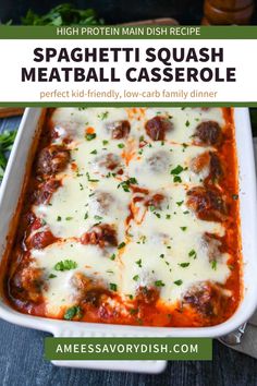 a casserole dish with meatballs and cheese in it