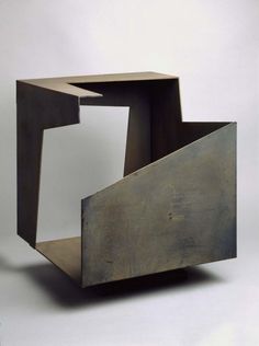 an abstract sculpture is shown against a white background