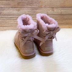 Reposhing This Item I Purchased From @Gigioscloset. Loved It, But Ready To Rotate For Something New. Questions? Leave A Comment Below! Pink Winter Boots, Pink Ugg Boots, Ugg Coquette, Uggs With Bows, Pink Uggs, Bow Boots, Ugg Mini, Shoes Ugg, Girly Shoes