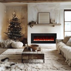 a living room filled with furniture and a fire place in the middle of the room