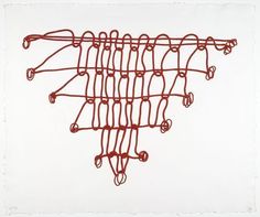 a red string art piece on white paper