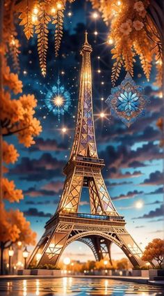 the eiffel tower is lit up at night