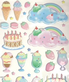 a bunch of stickers that are on top of a white sheet with some ice cream