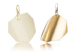 two gold and white earrings on a white background, one is shaped like an octagon