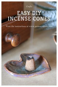 a small bowl with some rocks in it and the words easy diy incense cones