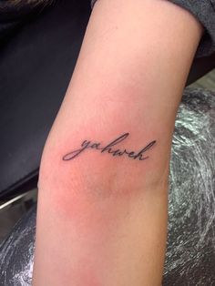 a woman's arm with a tattoo that reads, joyful in cursive writing