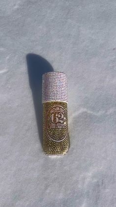 the bottle is covered with diamonds in the snow