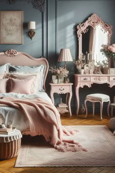 a bedroom with blue walls, pink bedding and an antique style mirror on the wall