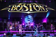 the boston band performing on stage