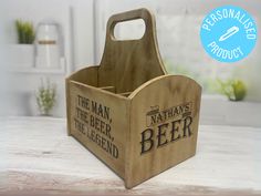 a wooden beer caddy sitting on top of a counter