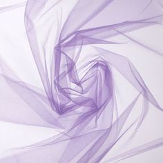 an abstract purple background with wavy lines