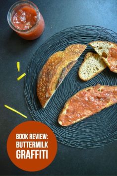 two pieces of bread on a plate with ketchup and mustard next to it