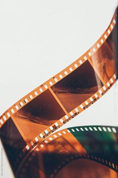 an old film strip with some blurry images on it's sides by luma studio for stocksy photography