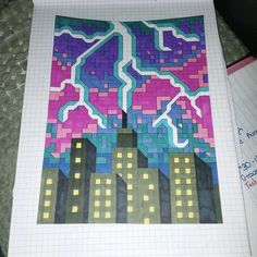 a piece of paper that has some type of cityscape on it with buildings in the background