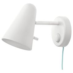 a white wall light with a green cord attached to the arm and an electric plugged into it