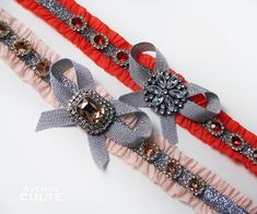 two ribbons with bows and jewels on them