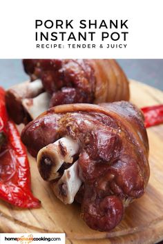 pork shank instant pot recipe tender and juicy on a cutting board with red peppers