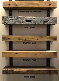 some wooden shelves that have different types of wood on them and labeled with names for each shelf