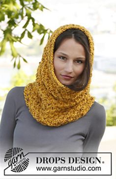 a woman wearing a yellow knitted cowl with the words drops design on it