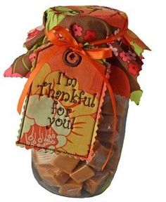 a jar that has some kind of candy in it with the words i'm grateful for you on it