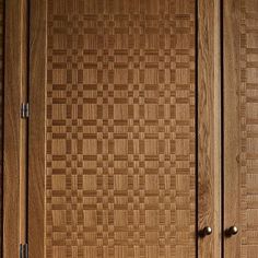 a wooden cabinet with some drawers in it