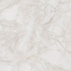 a white marble textured surface with black accents