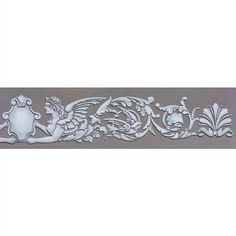 an ornate design on the side of a white wall with grey and silver accents,