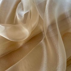 Champagne Sheer Organza Fabric by Yard, Lightweight, and Soft Fabric| Organza for Curtains|Lightweight Fabric for Wedding Gowns, Apparel, Crafts Organza fabric by the yard. This is a high-quality, sheer, and see-through type of elegant, non-stretchy fabric used to make curtains and other draperies or clothing like wedding gowns and evening gowns or prom dresses, or bridal dresses. Due to its stiffness can help to lend volume when sewing gowns, dresses, blouses, etc. In addition, this champagne c Make Curtains, Organza Fabric, Gold Crystal, Fabric By The Yard, Gowns Dresses, Wedding Gowns, Champagne, Yard, Fabric