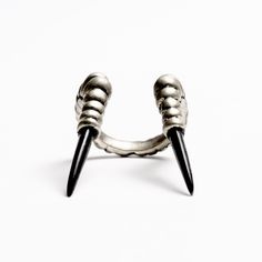 Claw Ring from our Savage collection with a natural tribal vibe. This statement ring will add a chic touch and will compliment your total look. This unisex ring has a lot of character! Its rough look will sure make an impression and upgrade your style. Perfect for men and women. Show your rough, edgy style with this unique style claw ring. For matching cuff bracelet please click here: https://www.etsy.com/uk/listing/861067020/gothic-dragon-bracelet-claw-cuff?ref=shop_home_active_14 Material: Bro Edgy Metal Rings For Halloween, Adjustable Black Jewelry For Fantasy Events, Gothic Metal Rings, Edgy Adjustable Rings For Halloween, Adjustable Punk Rings For Halloween, Unique Metal Rings For Halloween, Gothic Claw Rings As Gift, Adjustable Edgy Halloween Rings, Unique Claw Shaped Metal Rings