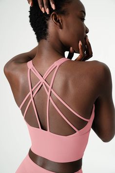 Keep your look top-notch and your performance A+ with our sleek Dusty Pink top. Designed with a classic scoopneck and a bold multi-crisscross back design, this strappy, fully-lined bra will have your back for various activities. It features a flattering long-line silhouette with removable cups for an optional shape. High-quality, breathable fabric feels lightweight and super soft to the touch. This versatile sports bra allows a great support with a nice 4-way stretch for your durable wear. Perfe Dusty Pink Top, Mommy And Me Swimwear, Pink Kelly, Sporty Crop Top, Neon Dresses, Pink Dusty, Sport Bikinis, Girls Lace Dress, Mommy And Me Dresses