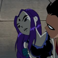 an animated image of a woman with purple hair and blue eyes looking at another woman's face