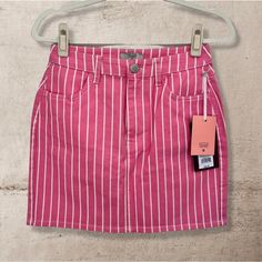 New With Tags Striped Pink Denim Mini Skirt Size 2 Pink With Vertical White Stripes Front Pockets Waist: 27 In, Hips: 37 In, Inseam Length: 8 In, Total Length: 16 In 98% Cotton, 2% Spandex Trendy High-waist Skirt For Spring, Trendy High Waist Skirt For Spring, Fitted Striped Mini Skirt For Spring, Chic Striped Skort For Spring, Pink High-waisted Denim Skirt For Spring, Spring Striped Mini Skirt, Pink Mini Denim Skirt For Summer, Striped Mini Skirt For Spring, Pink Fitted Trendy Denim Skirt