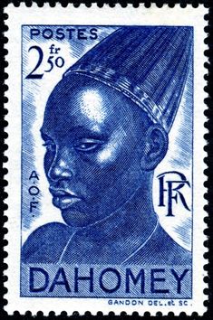 a stamp with an image of a woman's head and the words dahomey on