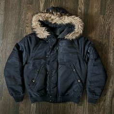 Very Rugged Bomber Polo Jacket. Puffy Down Interior. Small Distressed Graphic On Right Sleeve (Pictured). Three Pockets. Great For Winter. Classic Style And Look. Barely Worn. In Perfect Condition. Polo Jacket, Hot Spring, Puffy Jacket, Polo Ralph, Mens Polo, Classic Style, Faux Fur, Mens Jackets, Polo Ralph Lauren