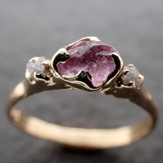 Lovely pink sapphire (home tumbled). I hand carved this setting in wax and cast it in recycled solid 14k yellow gold using the lost wax casting process. This one-of-a-kind raw gemstone ring is a size 7 it can be resized up or down for you as needed. The sapphire stone measures about 5mm. The side diamonds are around 2mm Throughout all time and history in every tribe and culture all around the world crystals, minerals and gemstones have been used for healing, luck, divination, adornment vibration Wax Carving Jewelry, Pink Engagement Ring, Raw Gemstone Ring, Raw Stone Ring, Wax Carving, Wax Casting, Minerals And Gemstones, Sapphire Stone, Lost Wax