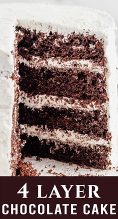 the four layer chocolate cake has white frosting on it and is ready to be eaten