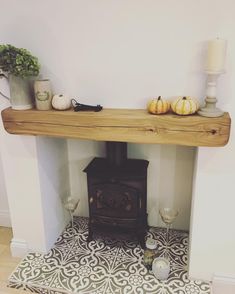 a wood burning stove sitting inside of a living room