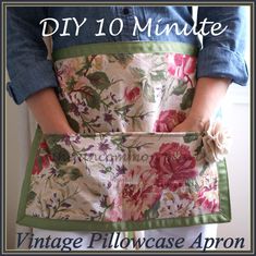 a woman holding an apron with flowers on it and the words diy 10 minute vintage pillowcase apron