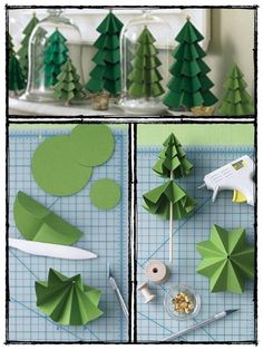 paper trees are cut out and placed on a cutting board