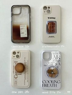 four different cell phones are arranged on a white surface, including one with an air freshener in it