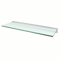 a glass shelf that is on the wall