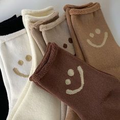 SUPER COZY AND CUTE HAPPY FACE SOCKS! Elevate your sock game with these super cozy and cute facesocks featuring a happy face on ankle. These socks with faces on them are the perfect way to add a touch of cheerfulness to any outfit. Crafted from soft and breathable fabric, they offer comfort and style in one delightful package. Let these face socks bring a smile to your face and spread positivity wherever you go. Comfy and Fashionable pair of socks Our happy face socks come in one unisex size and Playful Soft Socks For Winter, Playful Soft Winter Socks, Playful Super Soft Socks For Winter, Playful Super Soft Winter Socks, White Thick Casual Socks, Casual Thick White Socks, Cute Super Soft White Socks, Trendy Super Soft White Socks, Playful Soft White Socks